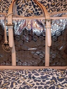 Michael Kors Metallic Silver Tote with Cream Trim and Logo Medallion